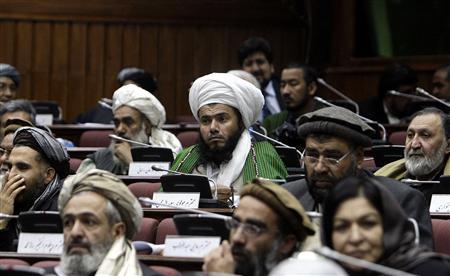 Afghan parliament members attend a voting session on the cabinet in Kabul