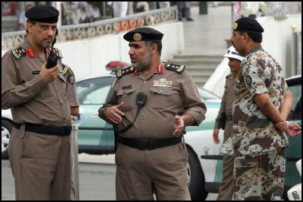 Saudi policemen secure the main square i