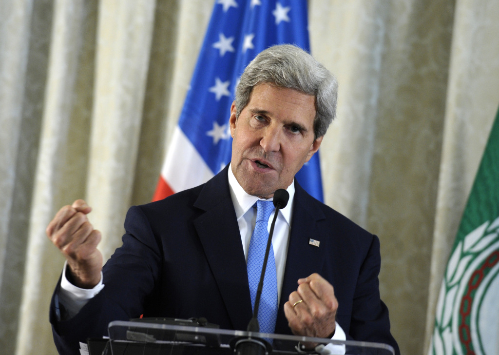 U.S. Secretary of State John Kerry answers a question during a news conference in Paris