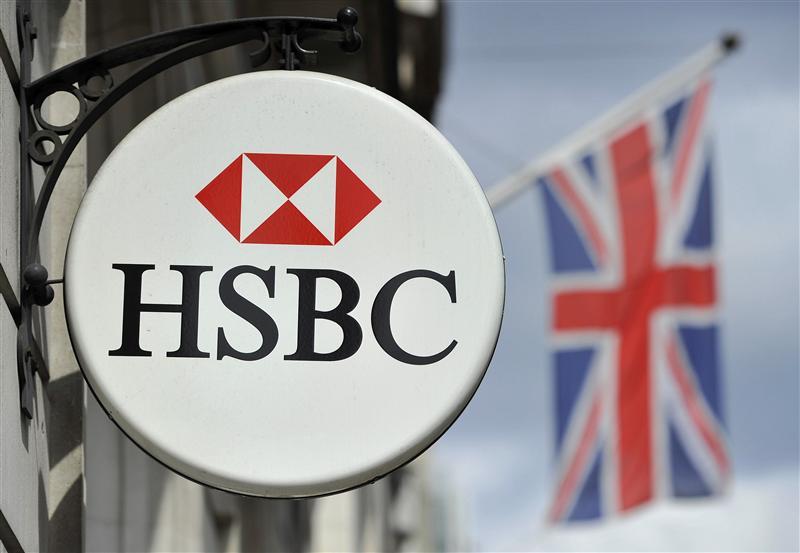 An HSBC bank branch logo is seen in central London