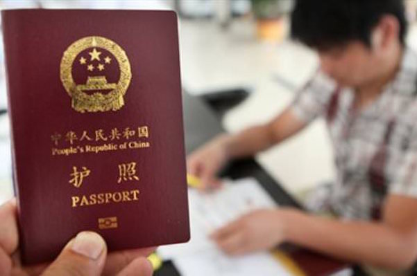 chinese-passport-persian-herald